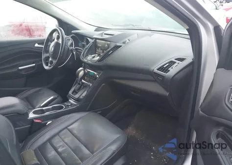 2015 Ford Escape Titanium z USA, uszkodzony, nr VIN 1FMCU9J99FUA75618